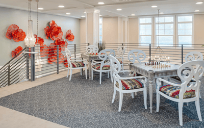Common area with seating and decorative wall art