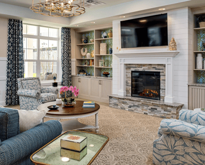Cozy common area with a fireplace and seating