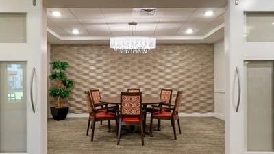 Elegant interior room with a round table and chairs