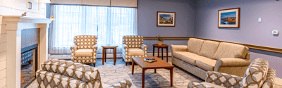 Cozy common area with seating and artwork