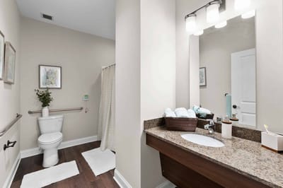Interior bathroom featuring a toilet and sink