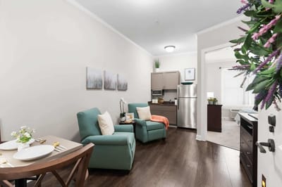Cozy interior view of a resident room with seating area