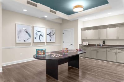 Bright activity room with arts and crafts setup