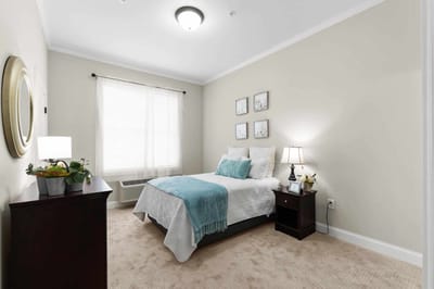 Cozy private resident room with a bed and decor