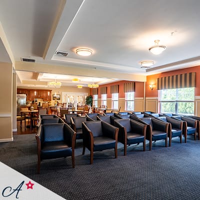 Interior lounge area with seating in a senior living facility