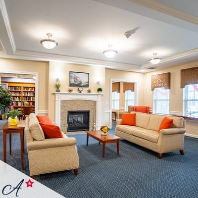 Comfortable lounge area with sofas and bookshelves