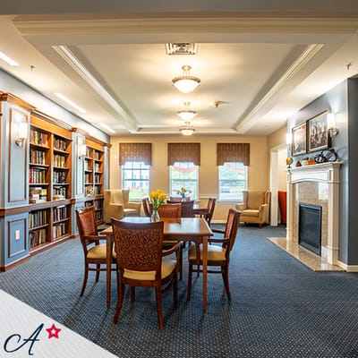Interior common area with bookshelves and seating