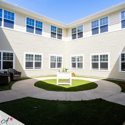 Outdoor courtyard with seating and greenery