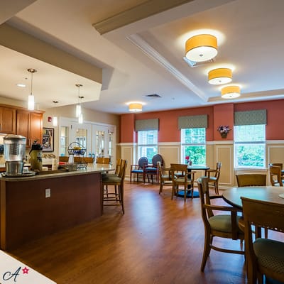 Bright dining area with tables and chairs