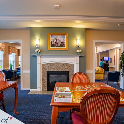 Common area with fireplace and seating