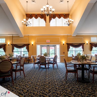 Bright dining room with elegant decor and tables