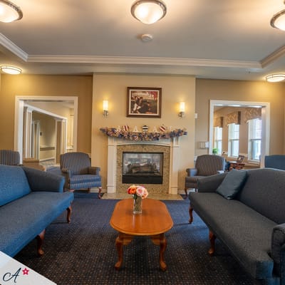 Interior view of a cozy common area with seating