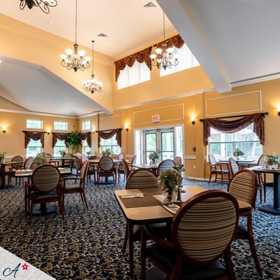 Bright dining room with tables and chairs