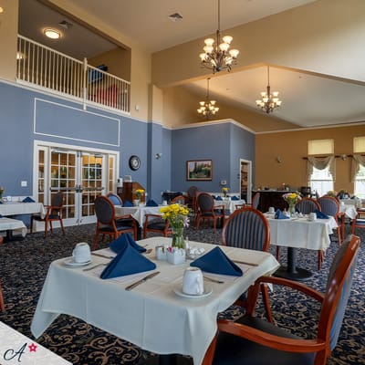 Elegant dining area with tables set for meals