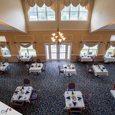 Spacious dining room with elegantly set tables