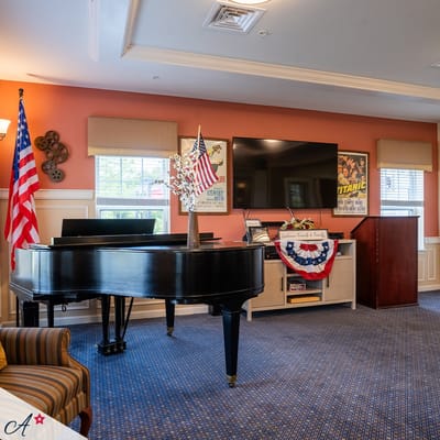 Interior common area with a piano and patriotic decor