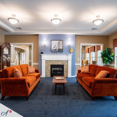 Cozy common area with comfortable seating and fireplace
