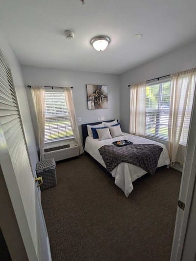 Cozy resident room with natural light and decor