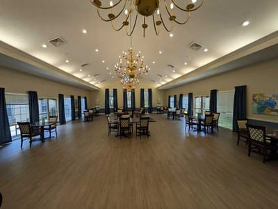 Bright and spacious dining area with tables and chairs