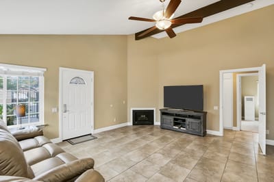 Bright living area with a large window and furniture