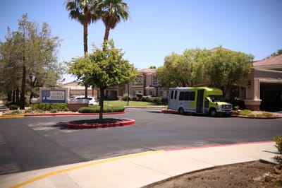 Exterior view of Atria Seville with facility transport