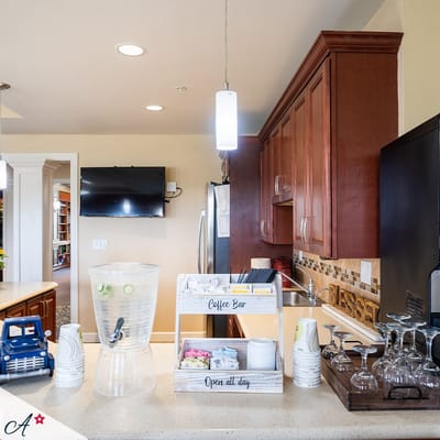 Bright kitchen area with coffee bar and refreshments