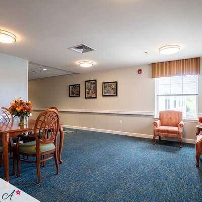 Bright common area with seating and decor