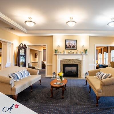 Cozy common area with seating and a fireplace