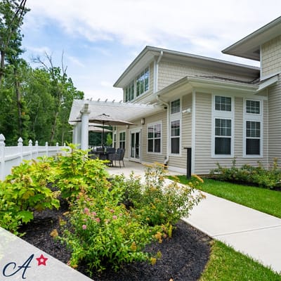 Outdoor view of the facility with landscaped pathway