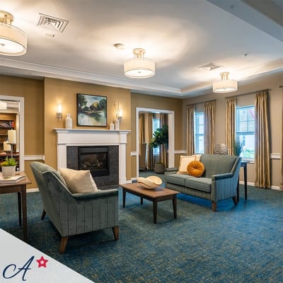Cozy interior lounge with seating and fireplace