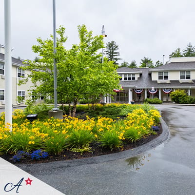 Exterior view of the facility with landscaping