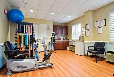 Interior view of a fitness room with exercise equipment