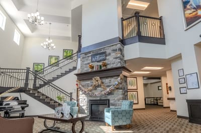 Bright common area with seating and decorative touches