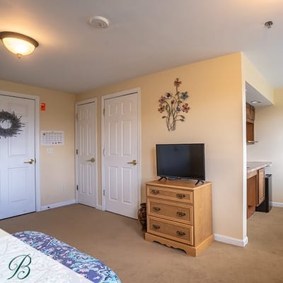 Cozy private resident room with furniture and decor