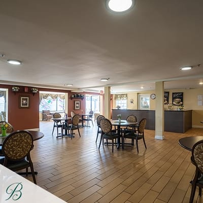 Interior view of the dining room with tables and chairs