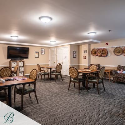 Interior common area with dining tables and chairs