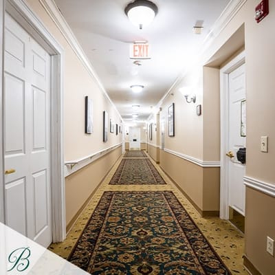 Interior hallway of the facility with patterned carpet