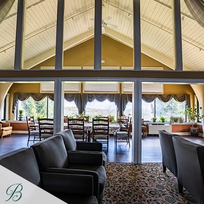 Interior view of a bright dining room with seating