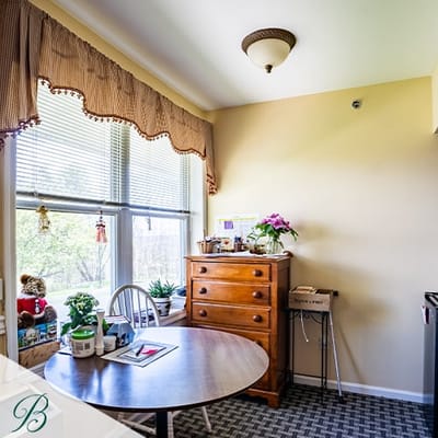 Bright corner of a resident's room with natural light