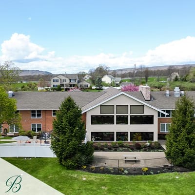 Aerial view of Bentley Assisted Living's exterior and garden