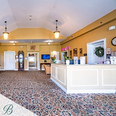 Interior view of a welcoming lobby with reception desk
