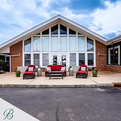 Outdoor seating area in front of the facility