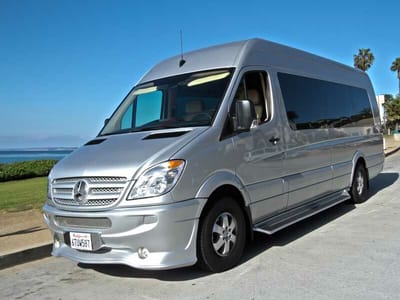 Silver transport vehicle near the beach