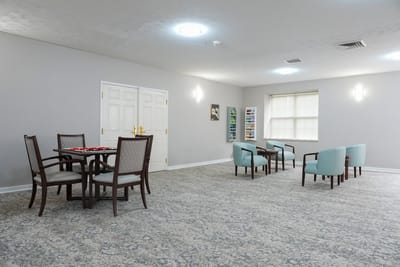 Comfortable common area with seating and dining table