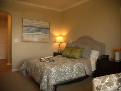 Cozy resident room with bed and decor