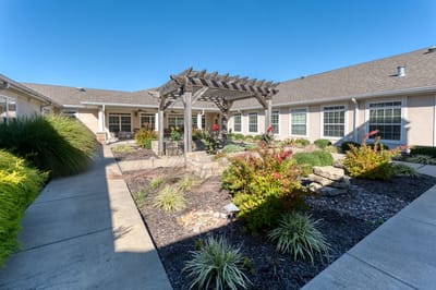 Outdoor garden area with seating and landscaping