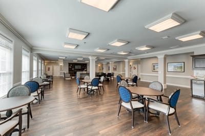 Interior common area with tables and chairs