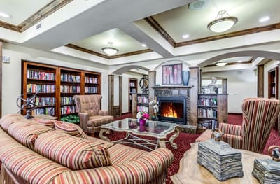 Cozy common area with bookshelves and seating