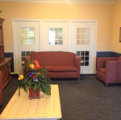 Cozy common area with seating and decorative plants