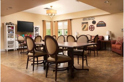 Common area with chairs and decorations for residents